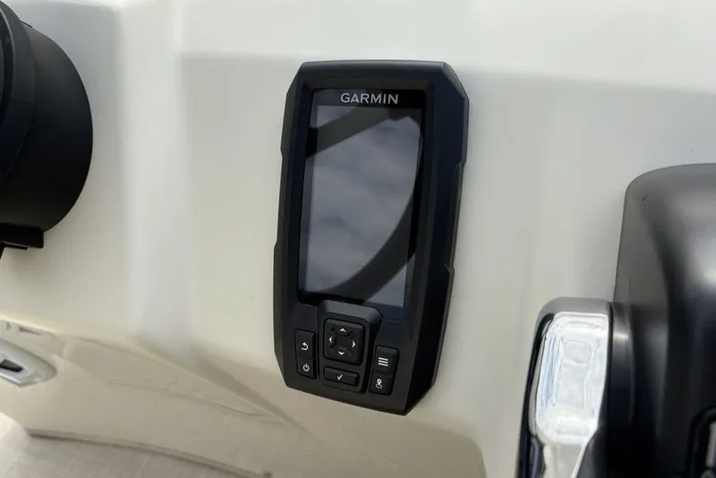 Slide: The Image of Garmin device on 2015 Bennington 24 S Series boat dashboard. - 21
