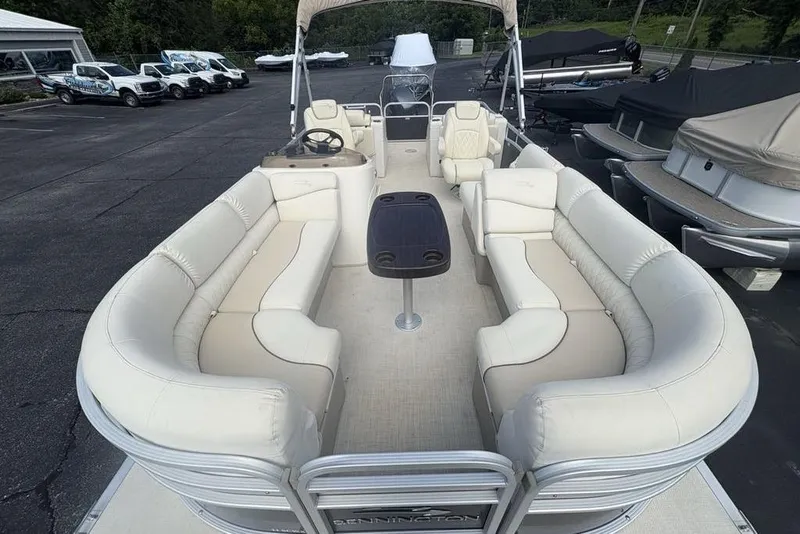 Slide: The Image of 2015 Bennington 24 S Series pontoon boat with spacious seating and sleek design. - 34