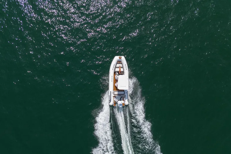 Slide: The Image of Aerial view of 2026 Tide Craft Galveston 19 boat cruising on open water. - 5