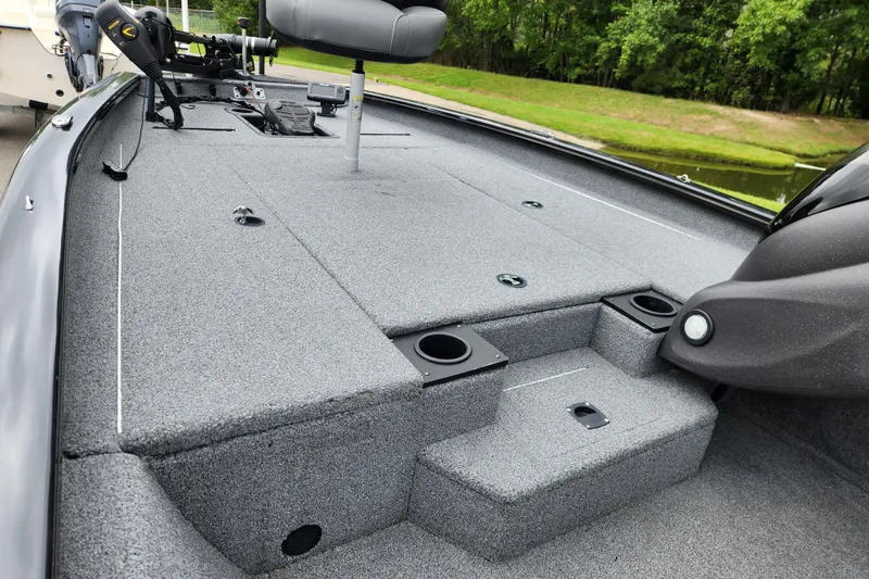 Slide: The Image of 2023 Tracker Pro Team 190 TX boat deck with seating and fishing equipment. - 7