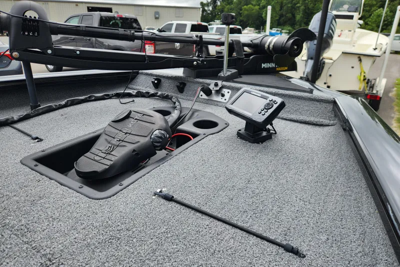 Slide: The Image of 2023 Tracker Pro Team 190 TX boat deck with trolling motor and fish finder. - 9