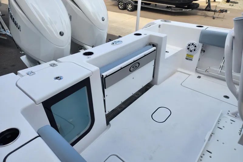 Slide: The Image of 2026 Sportsman Open 252 Center Console boat interior with Yamaha engines. - 12