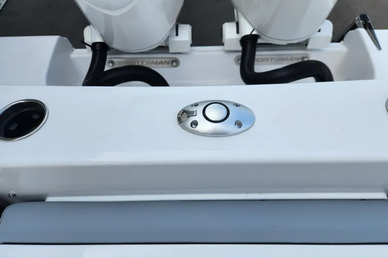 Slide: The Image of 2026 Sportsman Open 252 Center Console boat detail with dual engines and sleek design. - 13