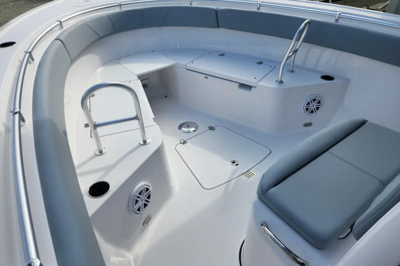 Slide: The Image of 2026 Sportsman Open 252 Center Console boat interior with seating and storage. - 5