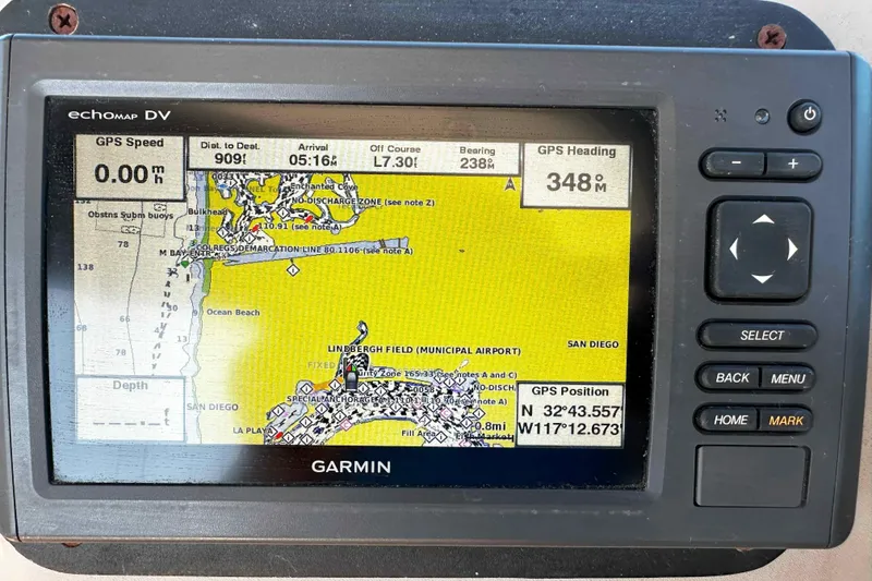 Slide: The Image of 1999 Sea Ray 330 Sundancer yacht docked at marina under blue sky. - 14