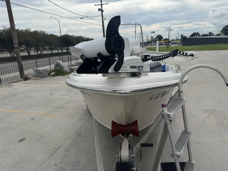 Slide: The Image of 2018 Key West 1720 Sportsman boat with Minn Kota trolling motor on trailer. - 12