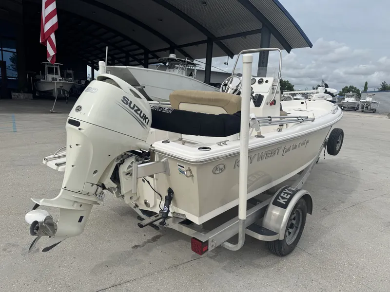 Slide: The Image of 2018 Key West 1720 Sportsman boat with Suzuki outboard motor on trailer. - 3