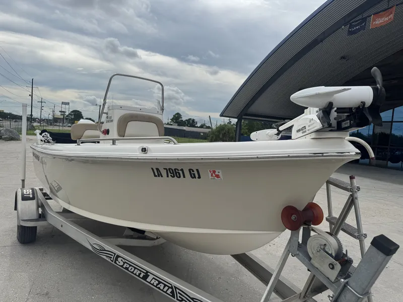 Slide: The Image of 2018 Key West 1720 Sportsman boat on trailer, parked outdoors. - 6