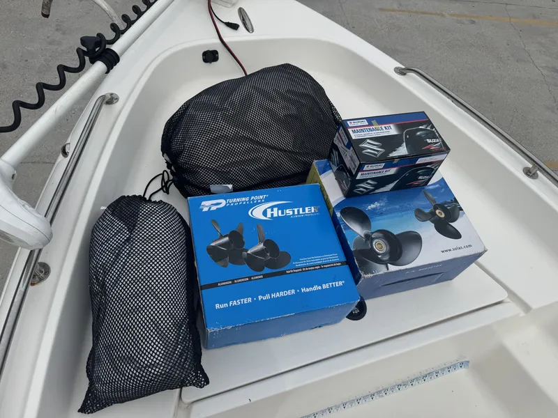 Slide: The Image of Boat accessories and maintenance kits on a 2018 Key West 1720 Sportsman deck. - 9