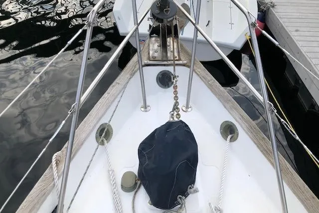 Slide: The Image of Bow of 1988 Pacific Seacraft 34 sailboat with anchor chain and ropes. - 3