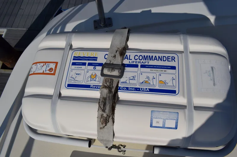 Slide: The Image of Liferaft on 2001 Kadey Krogen 48 boat, labeled "Revere Coastal Commander." - 48