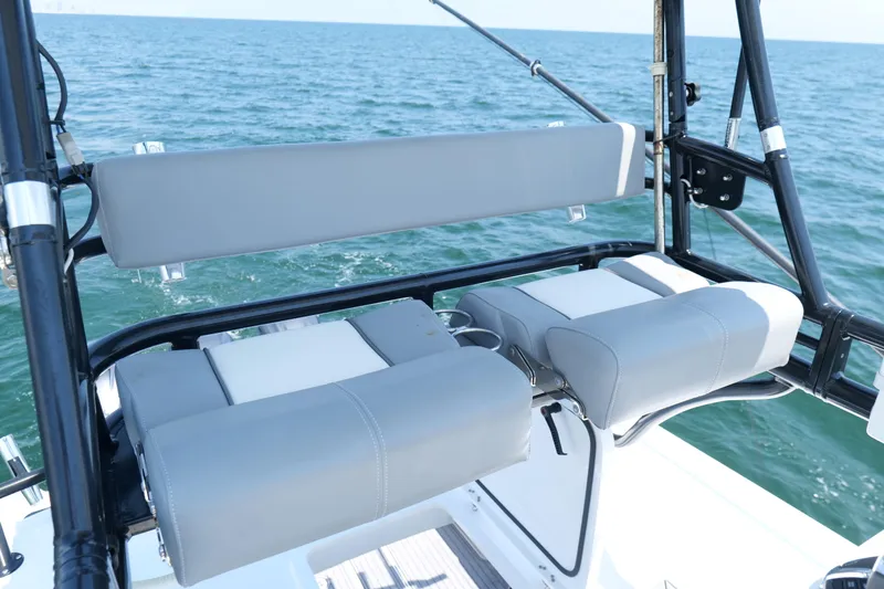 Slide: The Image of 2024 Everglades 395 Center Console boat seating with ocean view. - 42
