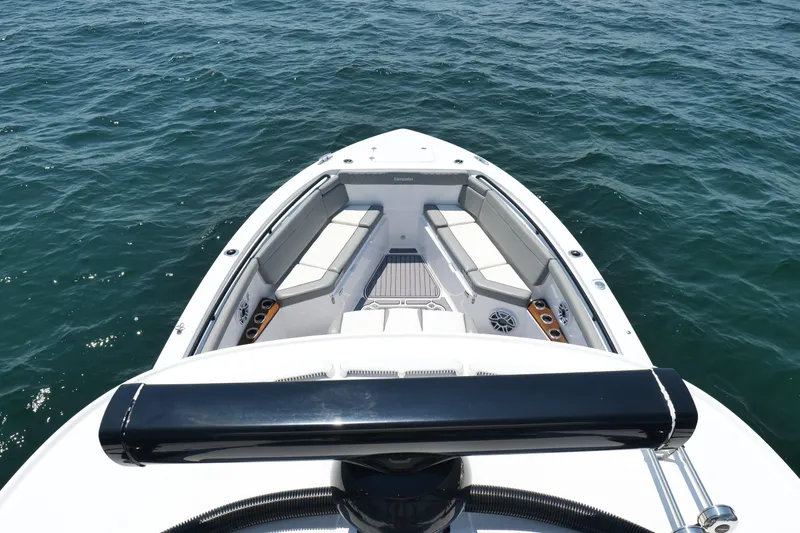 Slide: The Image of 2024 Everglades 395 Center Console boat with spacious seating on open water. - 44