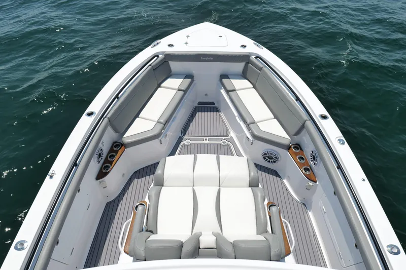 Slide: The Image of 2024 Everglades 395 Center Console boat interior with luxurious seating and ocean view. - 45