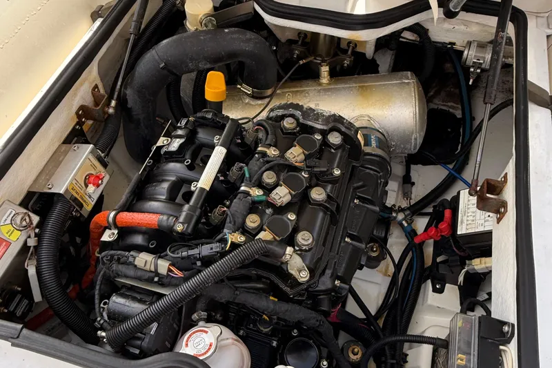 Slide: The Image of Engine compartment of 2021 Williams Jet Tenders SportJet 395, showcasing detailed components and wiring. - 6