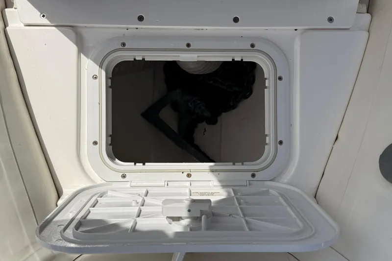 Slide: The Image of 2021 Williams Jet Tenders SportJet 395 storage compartment with open hatch. - 8