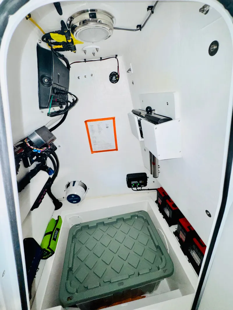 Slide: The Image of Interior of Reef Runner 230 c boat, model 2026. - 24