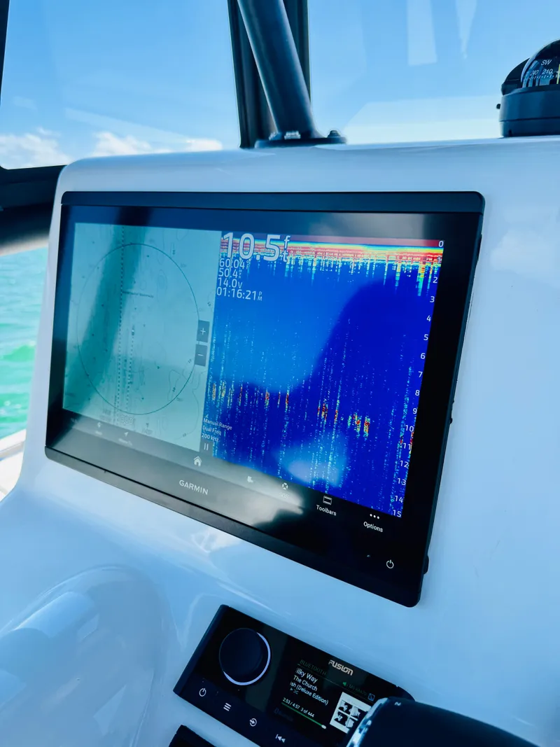 Slide: The Image of Garmin display on Reef Runner 230 c boat, 2026 model. - 9