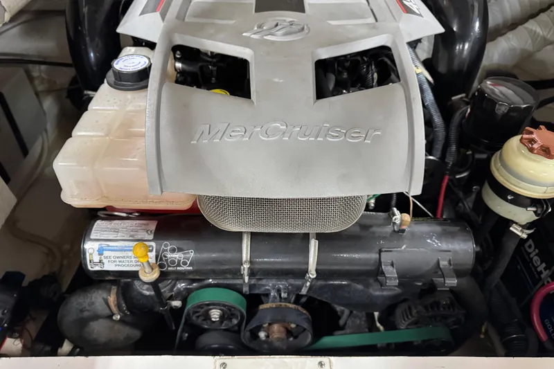 Slide: The Image of Engine compartment of a 2008 Rinker 296 Captiva Bowrider with MerCruiser engine. - 13