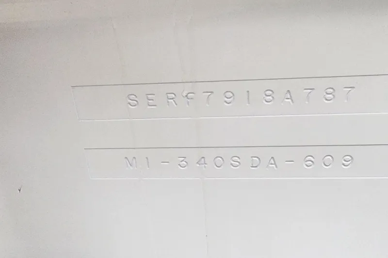 Slide: The Image of Hull identification number on 1987 Sea Ray 340 Sundancer boat. - 36