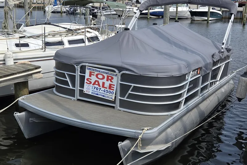 The Image of 2023 Godfrey Sweetwater 2086 CX pontoon boat for sale at marina dock. - 0
