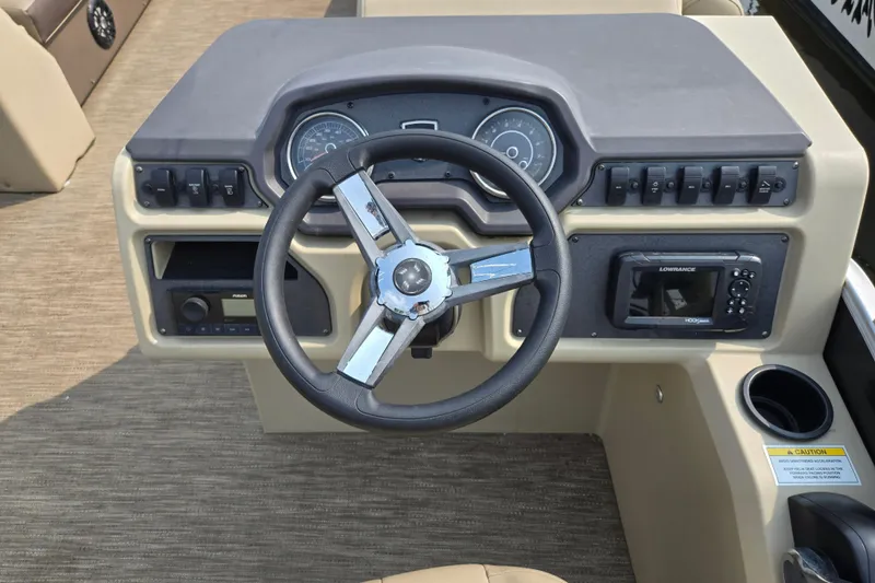 Slide: The Image of Steering console of 2023 Godfrey Sweetwater 2186 C pontoon boat with gauges and controls. - 7