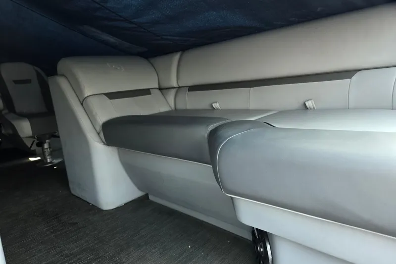 Slide: The Image of 2023 Godfrey Sweetwater 2286 SBX interior seating with gray upholstery. - 8