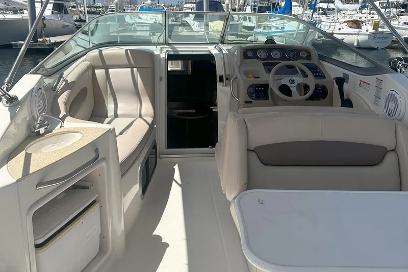 Slide: The Image of 2007 Chaparral Signature 250 boat interior with seating, steering wheel, and control panel. - 4