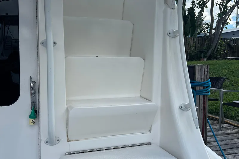 Slide: The Image of Staircase on 2008 Luhrs 35 Convertible boat, leading to upper deck. - 31