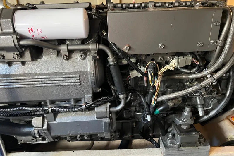 Slide: The Image of Engine of 2008 Luhrs 35 Convertible boat, showcasing intricate wiring and components. - 39