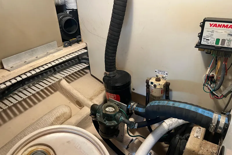 Slide: The Image of Engine room of a 2008 Luhrs 35 Convertible boat with Yanmar components. - 41