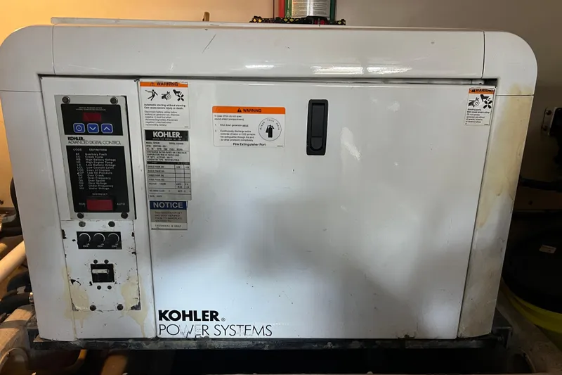 Slide: The Image of Kohler power system generator on a 2008 Luhrs 35 Convertible boat. - 42