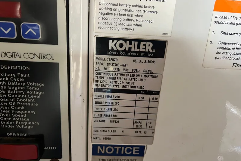 Slide: The Image of Kohler generator control panel on 2008 Luhrs 35 Convertible boat, model 7EFOZD. - 43