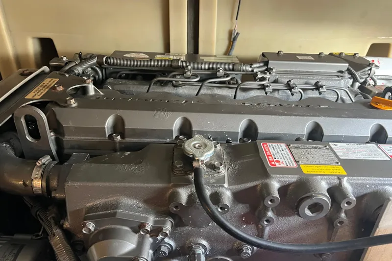 Slide: The Image of Engine of 2008 Luhrs 35 Convertible boat, showcasing detailed components and labels. - 45