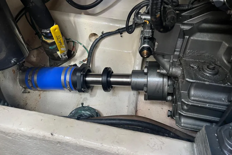 Slide: The Image of Engine compartment of 2008 Luhrs 35 Convertible boat, showing mechanical components and wiring. - 48