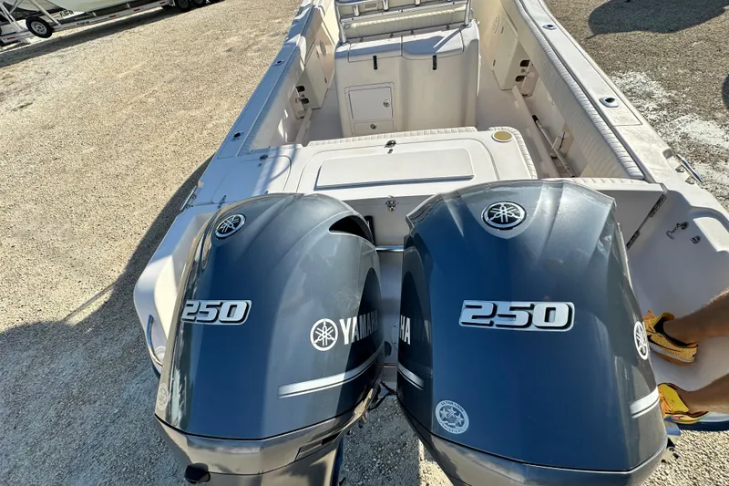 Slide: The Image of 2005 Grady-White Release 283 boat with twin Yamaha 250 engines, viewed from the stern. - 8