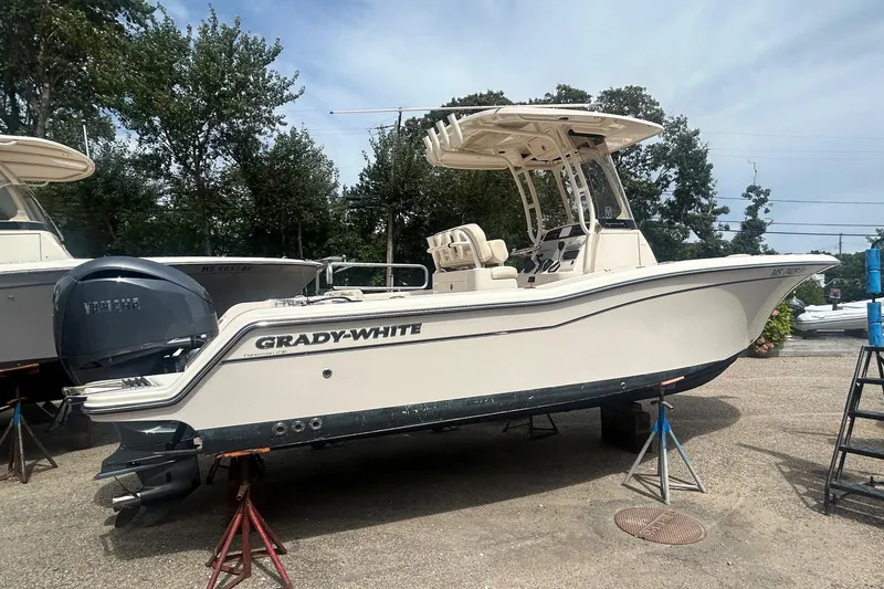 Slide: The Image of 2023 Grady-White Fisherman boat on display, featuring Yamaha outboard motor. - 10