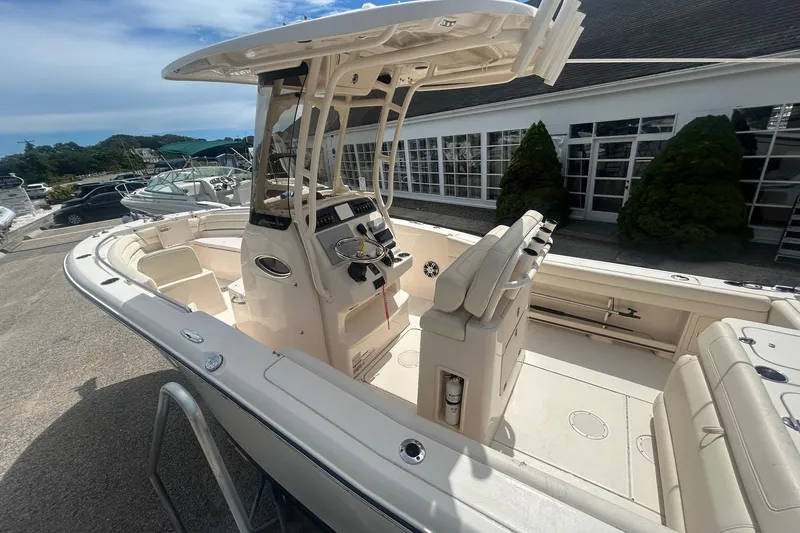 Slide: The Image of 2023 Grady White Fisherman boat on display with ladder access. - 5