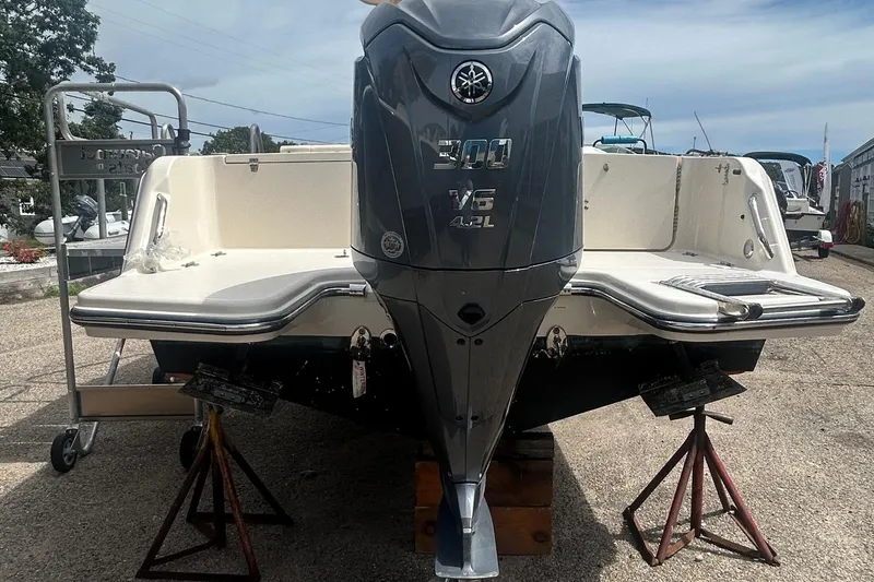 Slide: The Image of 2023 Grady White Fisherman boat with Yamaha 300 V6 engine on stands. - 9