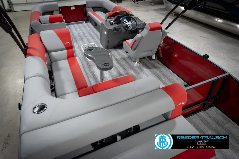 Slide: The Image of 2026 Bennington 22 SLJ pontoon boat interior with red and gray seating, modern design. - 14