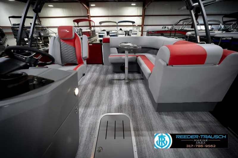 Slide: The Image of Interior of 2026 Bennington 22 SLJ pontoon boat with modern seating and steering console. - 16