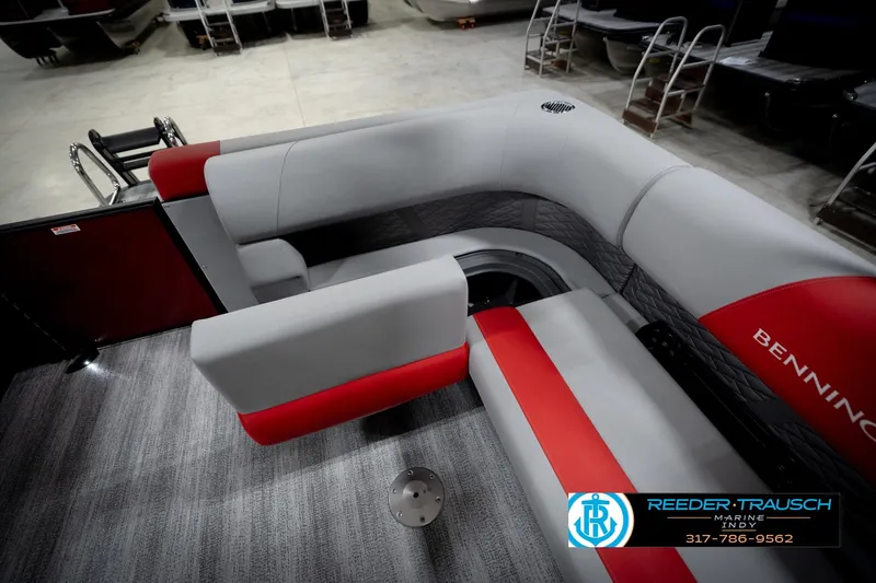 Slide: The Image of 2026 Bennington 22 SLJ pontoon boat interior with red and gray seating. - 26