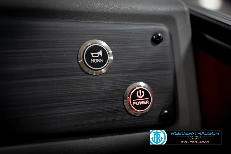 Slide: The Image of Dashboard of 2026 Bennington 22 SLJ with horn and power buttons. - 36