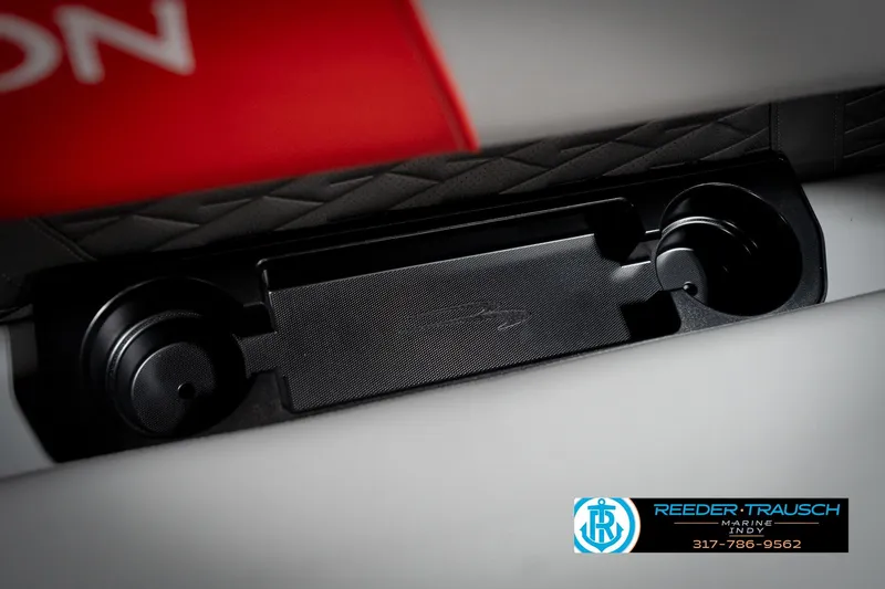 Slide: The Image of Interior detail of 2026 Bennington 22 SLJ boat with cup holders and branding. - 46