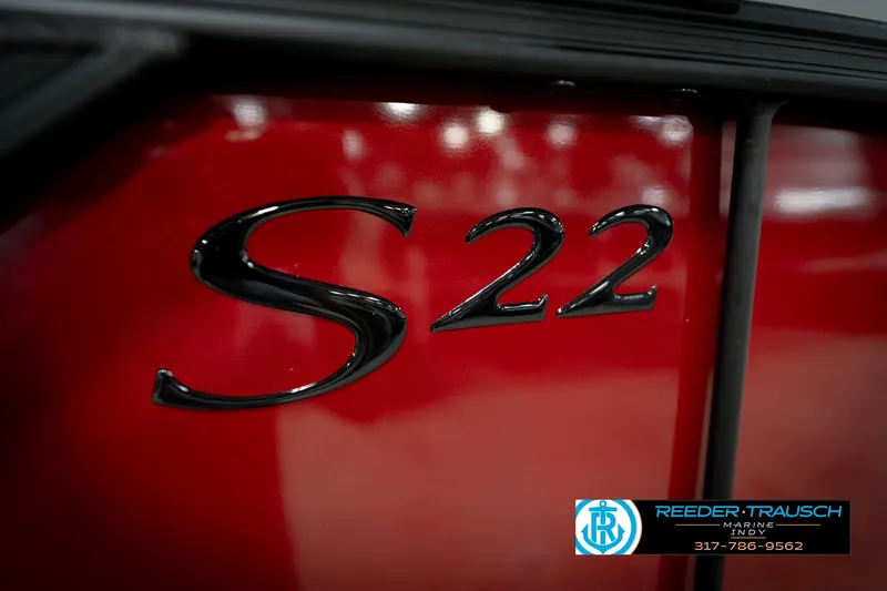 Slide: The Image of Close-up of 2026 Bennington 22 SLJ boat emblem on a red surface. - 50