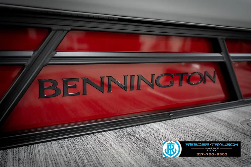 Slide: The Image of 2026 Bennington 22 SLJ boat with red paneling and Reeder-Trausch Marine logo. - 51