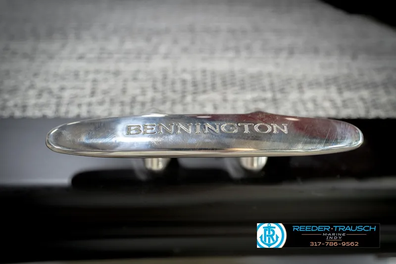 Slide: The Image of Close-up of a Bennington 22 SLJ 2026 boat cleat with engraved logo. - 52