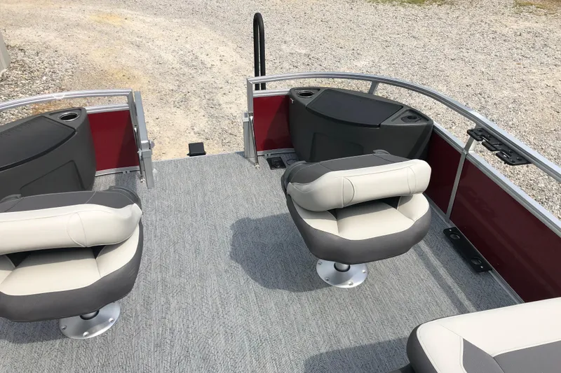 Slide: The Image of 2026 Sun Tracker Bass Buggy 18 DLX pontoon boat interior with swivel seats. - 12
