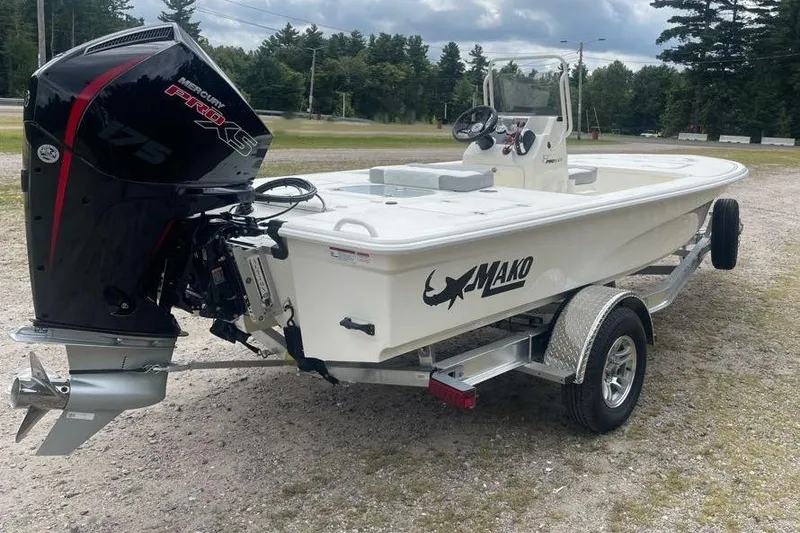 Slide: The Image of 2026 Mako 18 Pro Skiff boat with Mercury 175 engine on trailer. - 5