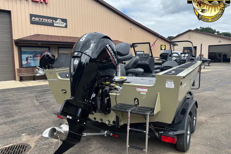 Slide: The Image of 2026 Tracker Targa V-18 Combo boat with Mercury engine at dealership. - 4